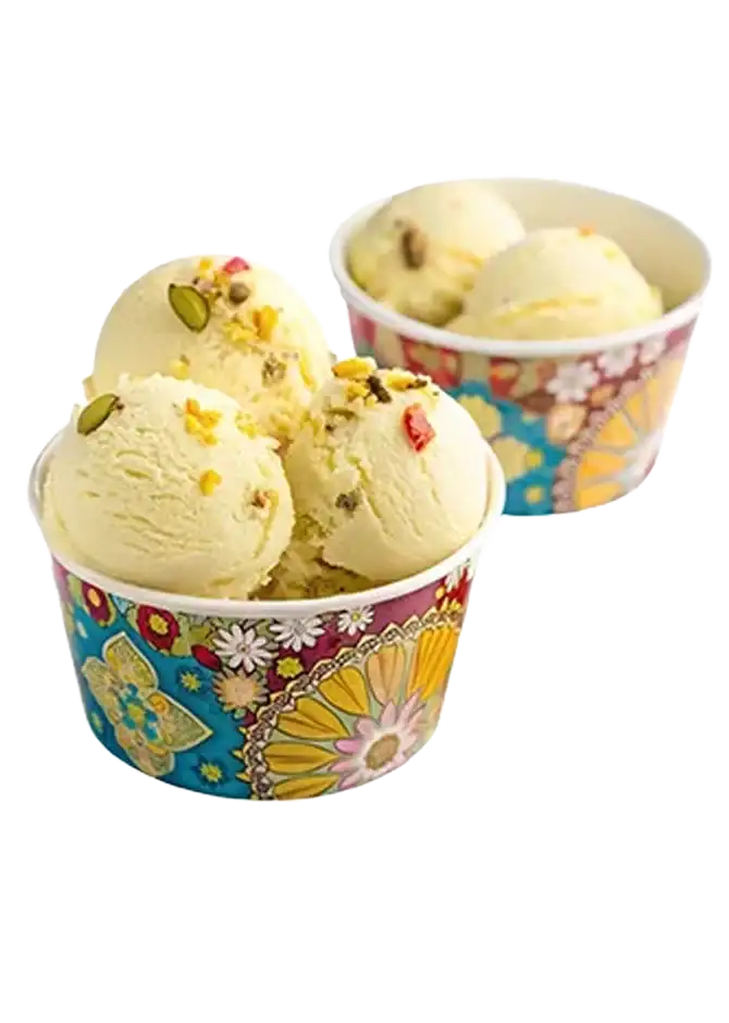 Arabic Gum dessert with fresh mango, whipped cream, mango ice cream, chocolate and mango syrup, and powdered sugar at Keds Ice Cream