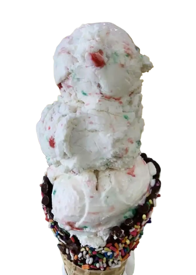 Birthday Cake ice cream dessert with Cinnamon Toast Crunch, whipped cream, and chocolate drizzle at Keds Ice Cream