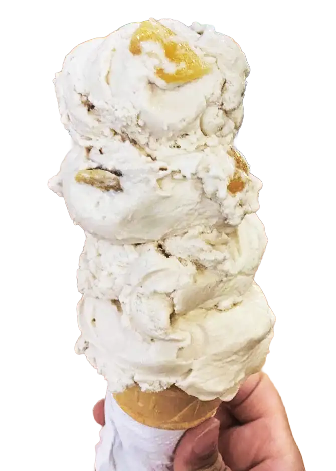 Cashew Fig ice cream dessert with Cinnamon Toast Crunch, whipped cream, and chocolate drizzle at Keds Ice Cream