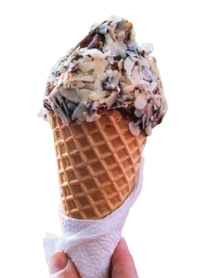 Cookies and Cream Cinnamon Toast Crunch ice cream with whipped cream and chocolate syrup at Keds Ice Cream