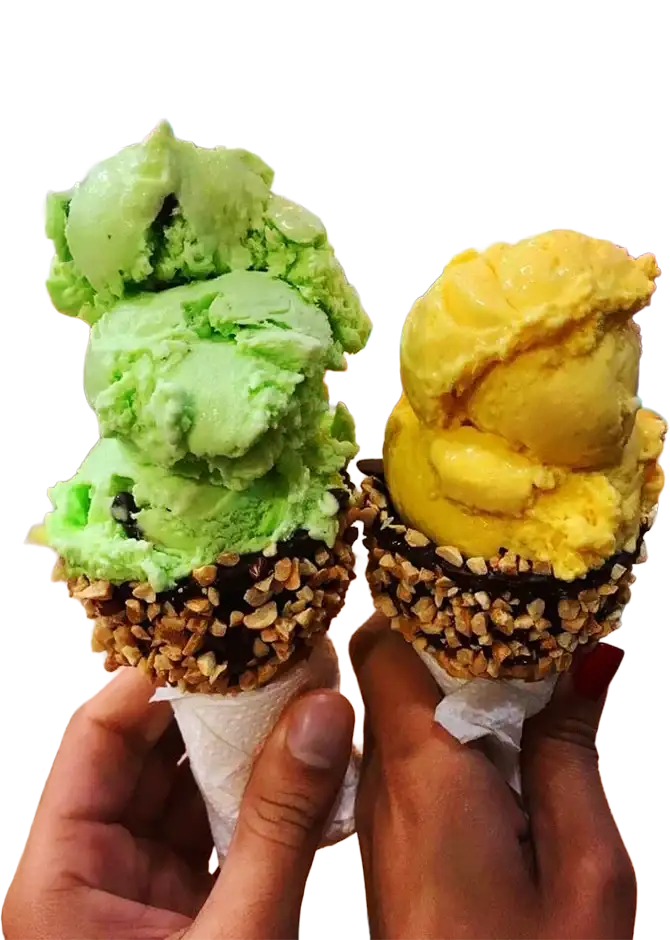 Keds Ice Cream Cinnamon Toast Crunch dessert with whipped cream, cinnamon ice cream, chocolate syrup, and powdered sugar